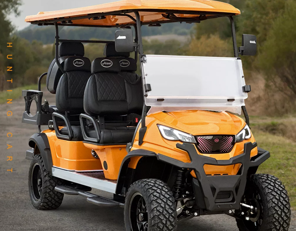 "A row of colorful golf carts parked on a grassy area, ready for use on a golf course or community outing."